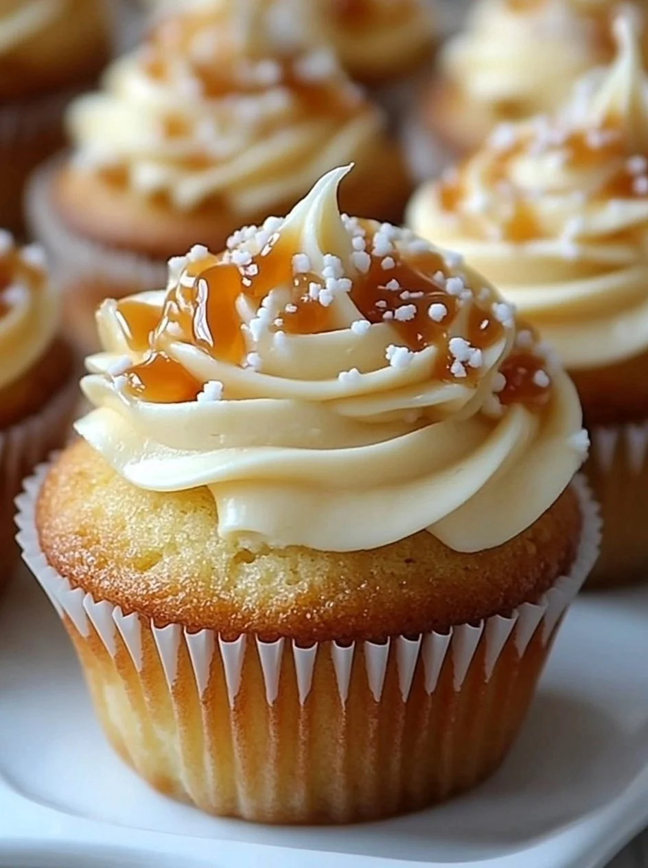 Delicious salted caramel cream cheese cupcakes on a decorative platter