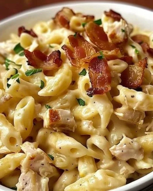 Chicken Bacon Ranch Pasta 2 Creamy Chicken Bacon Ranch Pasta served in a bowl with fresh herbs