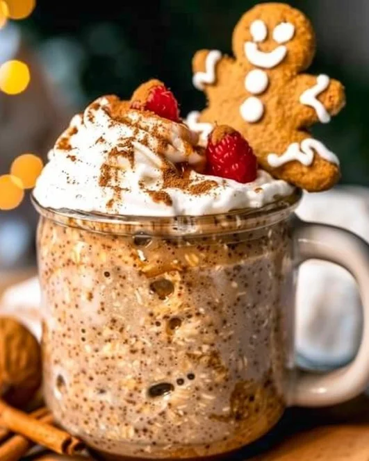High Protein Gingerbread Overnight Oats 2 Bowl of high protein gingerbread overnight oats topped with spices and nuts