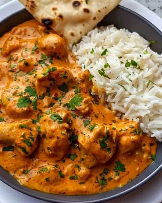 Quick & Easy Homemade Butter Chicken 2 Delicious homemade butter chicken served with rice on a plate