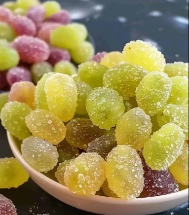 Tangy Twist Sour Patch Grapes for a Sweet and Sour Sensation! 2 Sour Patch Grapes - a sweet and sour snack featuring a tangy twist